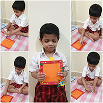Nursery kids caged their sweet fond memories by making square shaped photo frame.